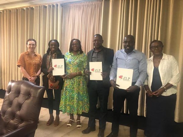 Healthcare professionals in panel discussion at international conference